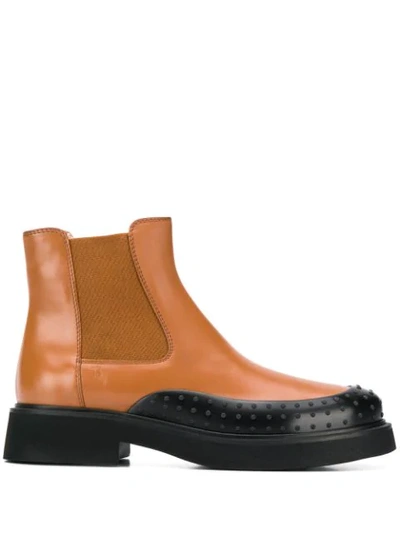 Shop Tod's Pebble Detail Ankle Boots In Brown