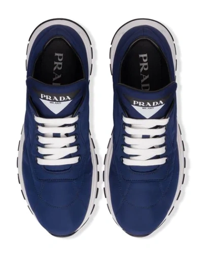 Shop Prada Stitched Panels Low Top Sneakers In Blue