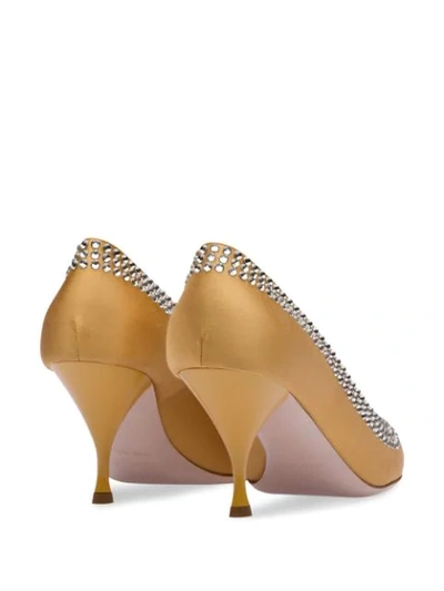 Shop Miu Miu Crystal Embellished Pumps In F0091 Ochre