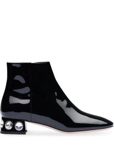 Shop Miu Miu Crystal-embellished Ankle Boots In Black