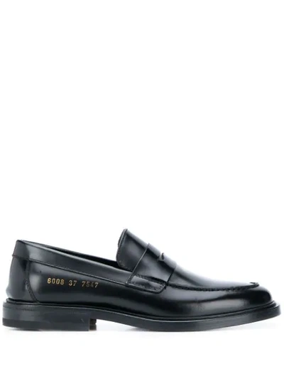 Shop Common Projects Embossed Logo Loafers In Black
