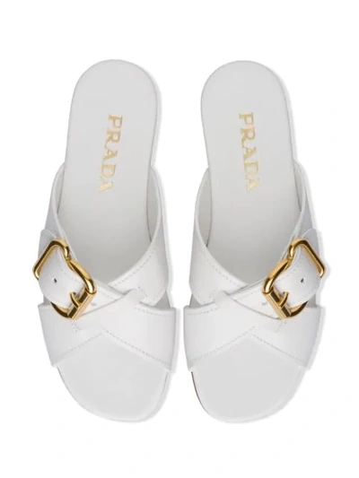 PRADA CROSSOVER BUCKLE SANDALS 