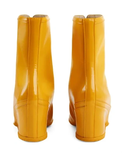 Shop Gucci Water-resistant Ankle Boots In Yellow