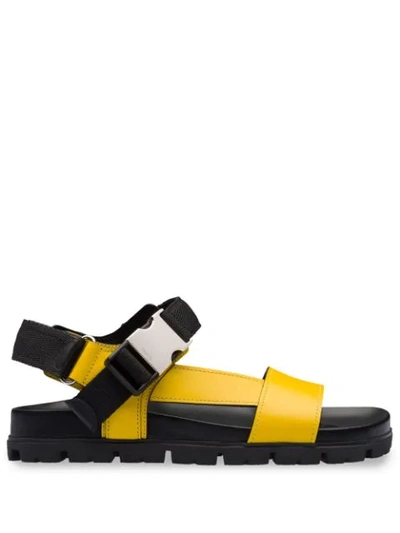 Shop Prada Buckle Detailed Flat Sandals In Yellow