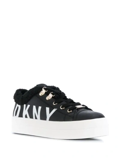 Shop Dkny Faux Shearling Logo Sneakers In Black