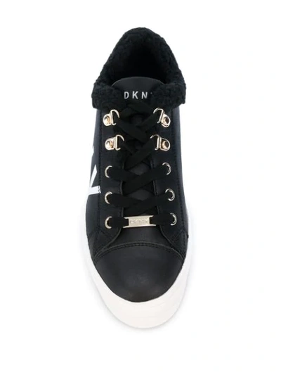 Shop Dkny Faux Shearling Logo Sneakers In Black