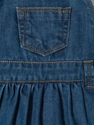 Shop Knot Denim Pinafore Dress In Blue