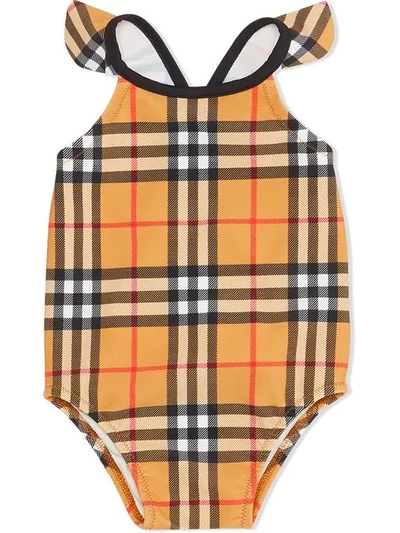 Shop Burberry Ruffle Detail Vintage Check Swimsuit In Yellow