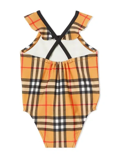 Shop Burberry Ruffle Detail Vintage Check Swimsuit In Yellow