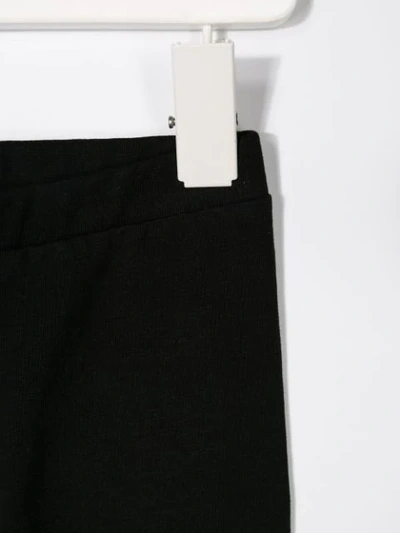 Moschino Two Tone Logo Print Leggings In Black