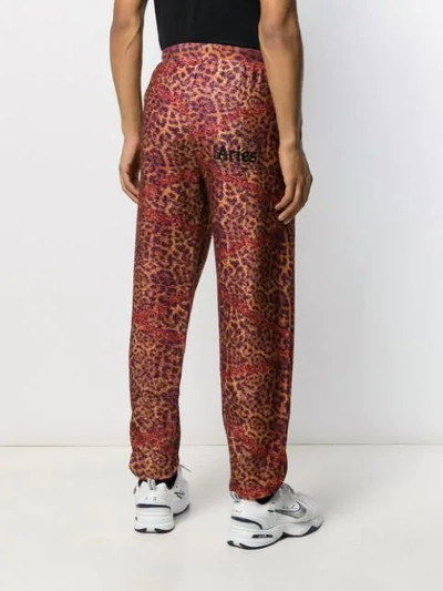 Shop Aries Leopard Print Fleece Track Pants