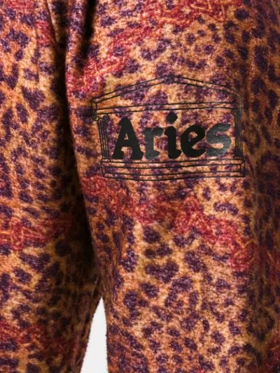 Shop Aries Leopard Print Fleece Track Pants