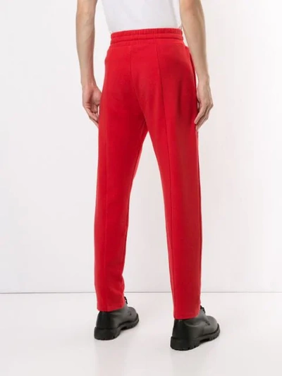 Shop Ports V Forward Print Track Pants In Red