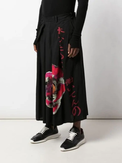 Shop Yohji Yamamoto Printed Wide Leg Trousers In Black