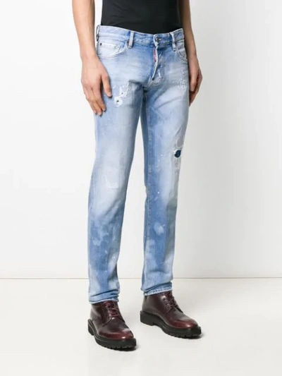 Shop Dsquared2 Distressed Effect Logo Patch Jeans In Blue