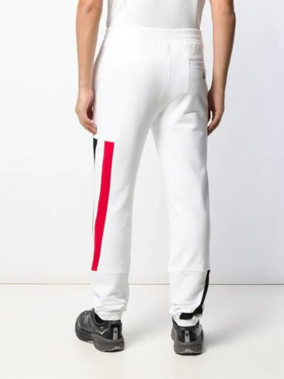 Shop Moncler Abstract Print Track Pants In White