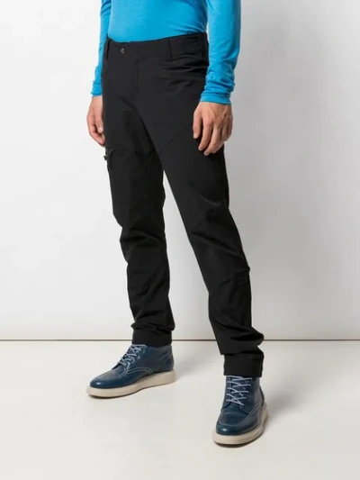 Shop Klättermusen Straight Leg Cargo Trousers In Black