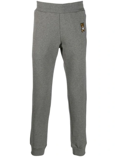 Shop Moschino Teddy Bear Logo Trousers In Grey