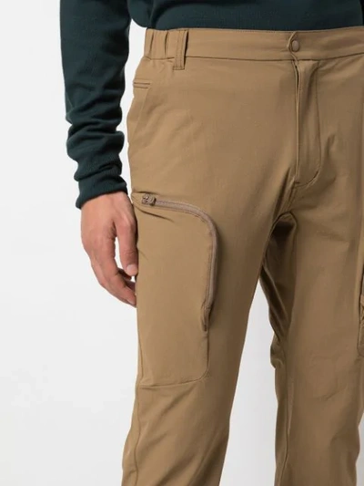Shop White Mountaineering Tapered-leg Cargo Trousers In Brown