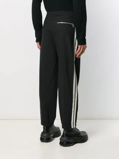 Shop Neil Barrett Double Striped Jersey Trousers In Black