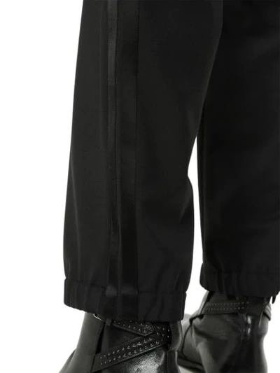 Shop Neil Barrett Striped Wool Trousers In Black