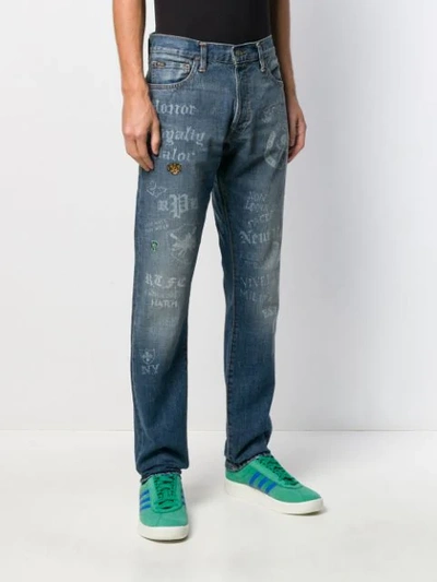 Shop Polo Ralph Lauren Lettering Print Slim-fit Jeans In Blue