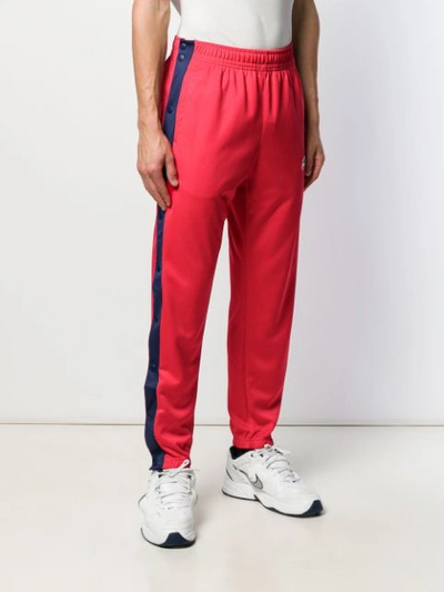 Shop Nike Logo Patch Track Pants In 657