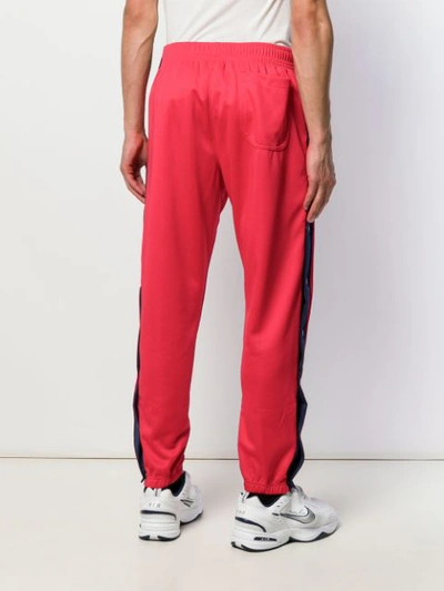Shop Nike Logo Patch Track Pants In 657