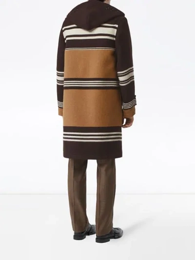 Shop Burberry Hooded Striped Duffle Coat In Brown
