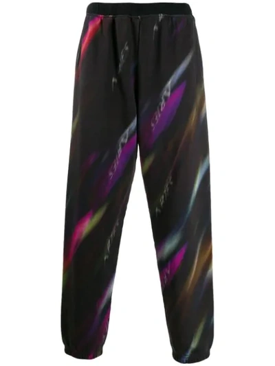 Shop Aries Long Logo Print Track Pants In Black