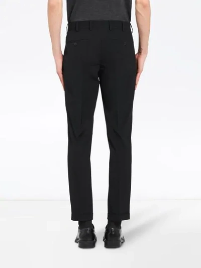 Shop Prada Slim-fit Twill Trousers In Black
