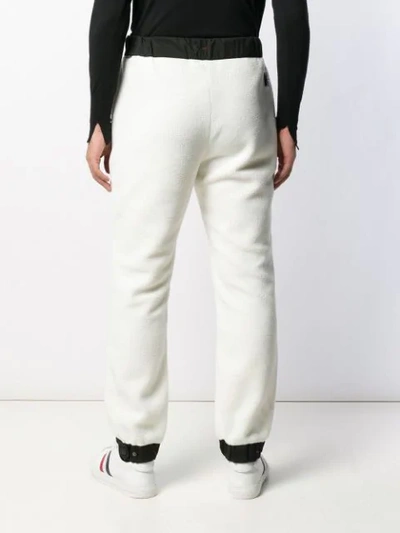 Shop Moncler Logo Print Fleece Trousers In White