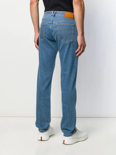 Shop Versace Regular Fit Jeans In Blue