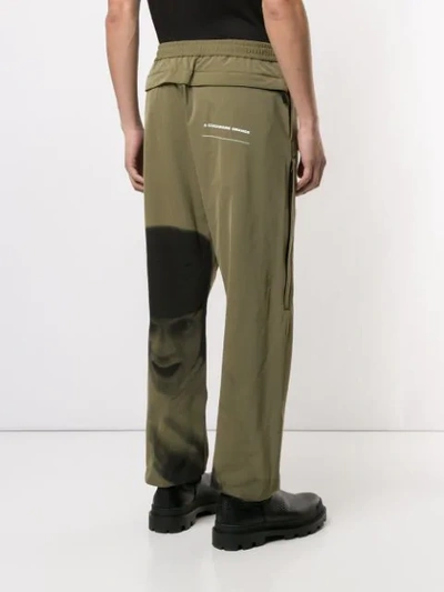 Undercover A Clockwork Orange Print Track Pants In Green