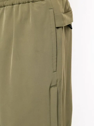 Undercover A Clockwork Orange Print Track Pants In Green