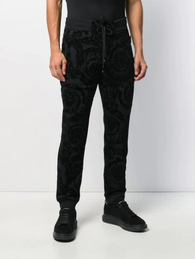 Shop Versace Jeans Couture Printed Track Pants In Black