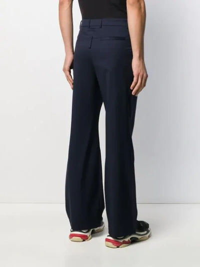 Shop Martine Rose Double Flare Tailored Trousers In Blue