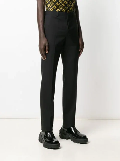 Shop Givenchy Ribbon Trimmed Logo Trousers In Black