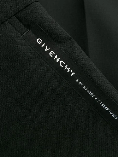 Shop Givenchy Ribbon Trimmed Logo Trousers In Black
