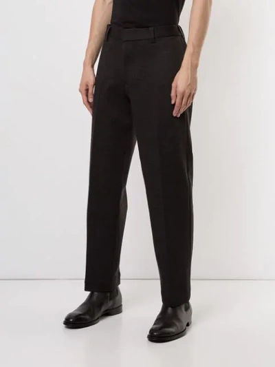 Shop Emporio Armani Tapered Tailored Trousers In Black