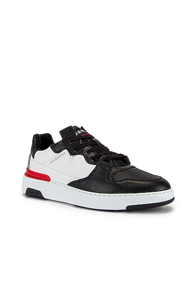 Shop Givenchy Wing Low Top Sneaker In Black & White