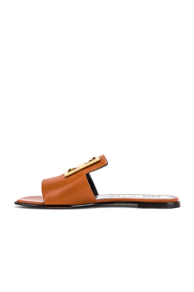 Shop Givenchy 4g Flat Mule Sandals In Blond