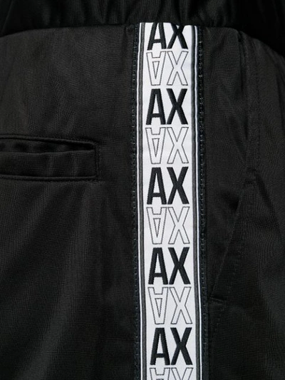 Shop Armani Exchange Logo Striped Track Pants In Black