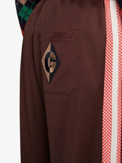 Shop Gucci Jogginghose Mit "g Rhombus"-patch In Brown