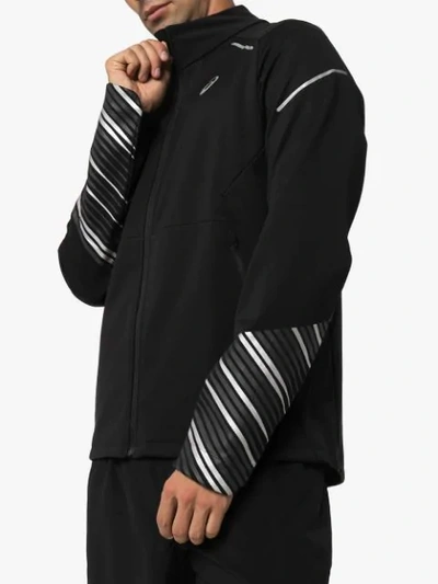 Shop Asics Liteshow Windbreaker Jacket In Black