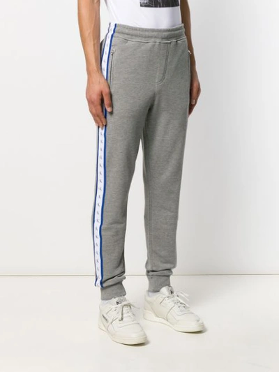 Shop Calvin Klein Jeans Est.1978 Logo Tape Track Pants In Grey