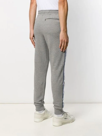 Shop Calvin Klein Jeans Est.1978 Logo Tape Track Pants In Grey