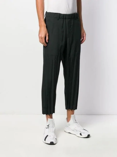 Shop Issey Miyake Pleated Detail Trousers In Black