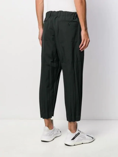 Shop Issey Miyake Pleated Detail Trousers In Black