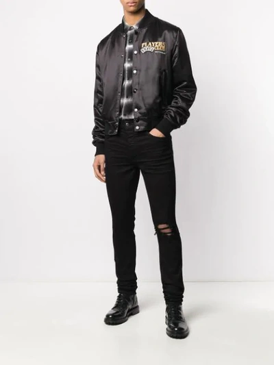 Amiri Distressed Slim Fit Jeans In Black